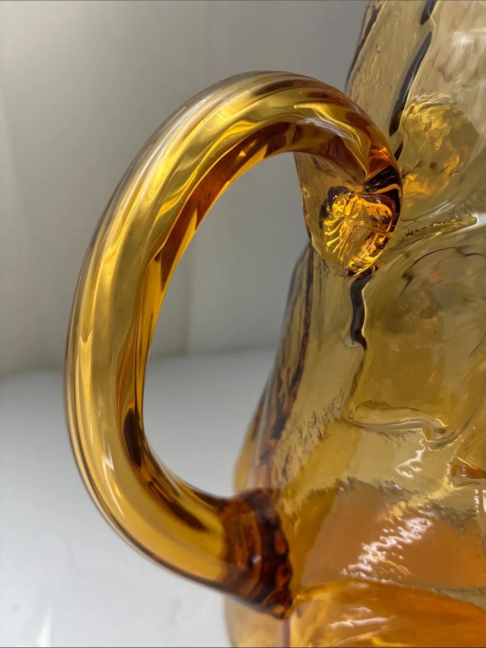 Amber Pressed Glass Pitcher with Fruit Motif
